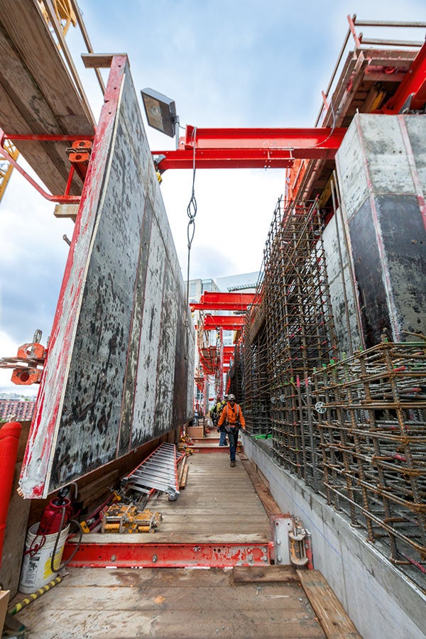 Using three PERI ACS Core 400 Automatic Climbing Systems with PERI’s MAXIMO formwork to place the thick walls of the 36-ft by 90-ft<br/>core, which consists of three cells. 