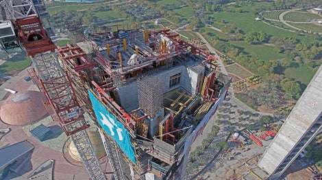 The narrow core walls made access difficult while the floor heights reached up to 10m. For that, PERI UP tower was suspended form the ACS platform, making the top levels easily accessible.