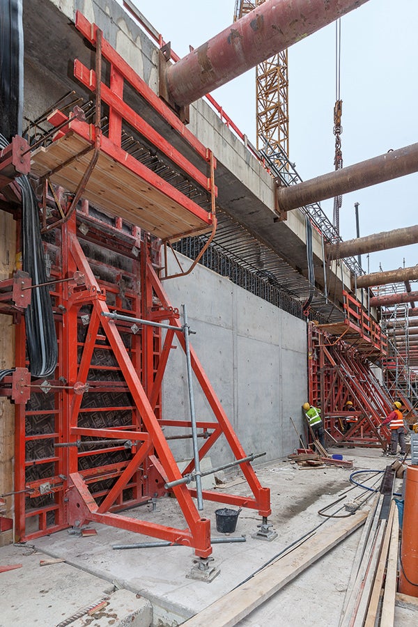 Trough and tunnel fabrication at a depth of up to 20 meters within a diaphragm wall excavation pit. 