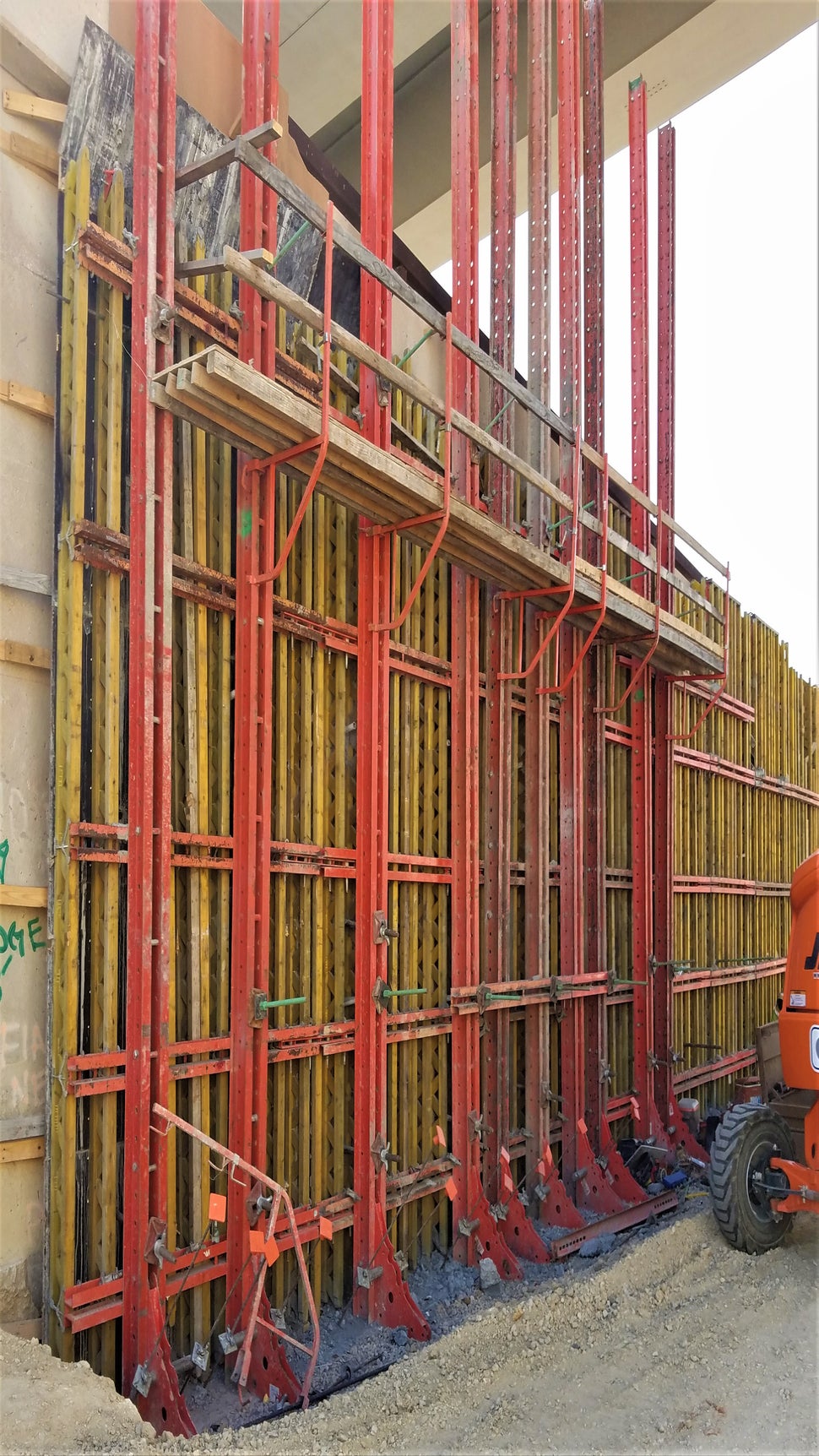 First the one sided walls had to be formed and tied to soil nails