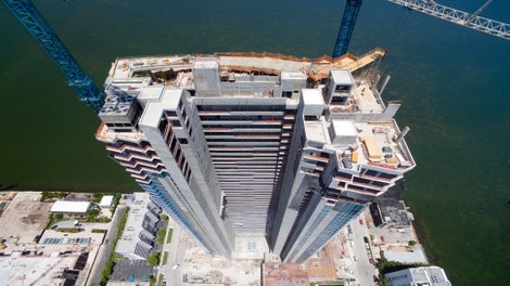 The 399 luxury residences will offer downtown waterfront living that includes a manmade beachfront and interior designs by Thom Filicia.