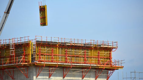 Formwork being crane-lifted for installation