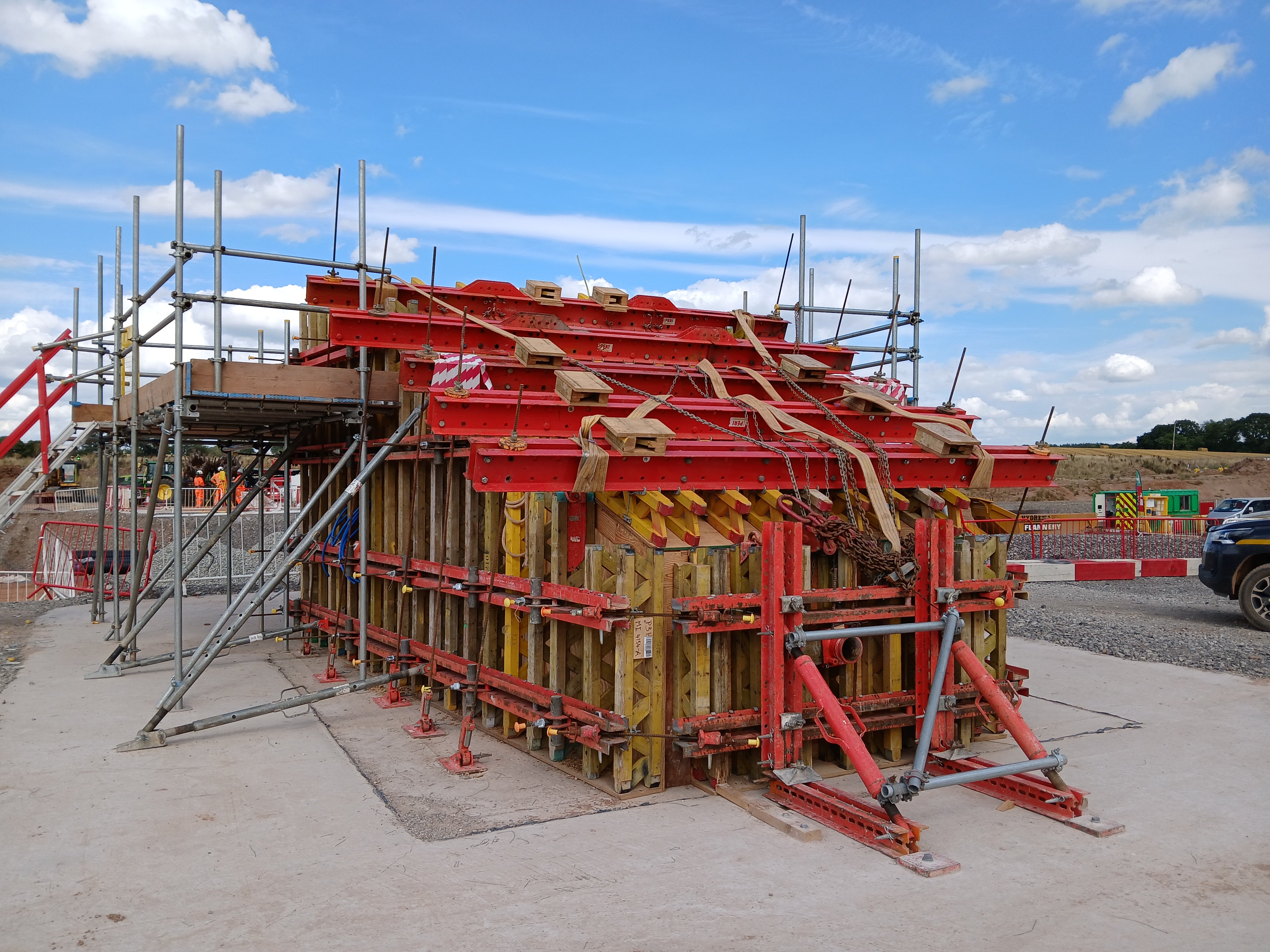 Custom VARIOKIT formwork assembled for the W129 Footbridge Pier, featuring bespoke AI-cut box-out components and integrated digital compaction sensors to ensure precise, high-quality concrete placement.
