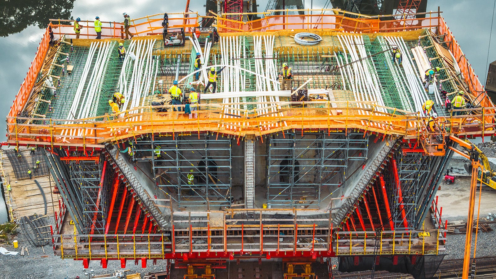 Installation of rebar and post-tensioning in progress, preparing for Pour #3