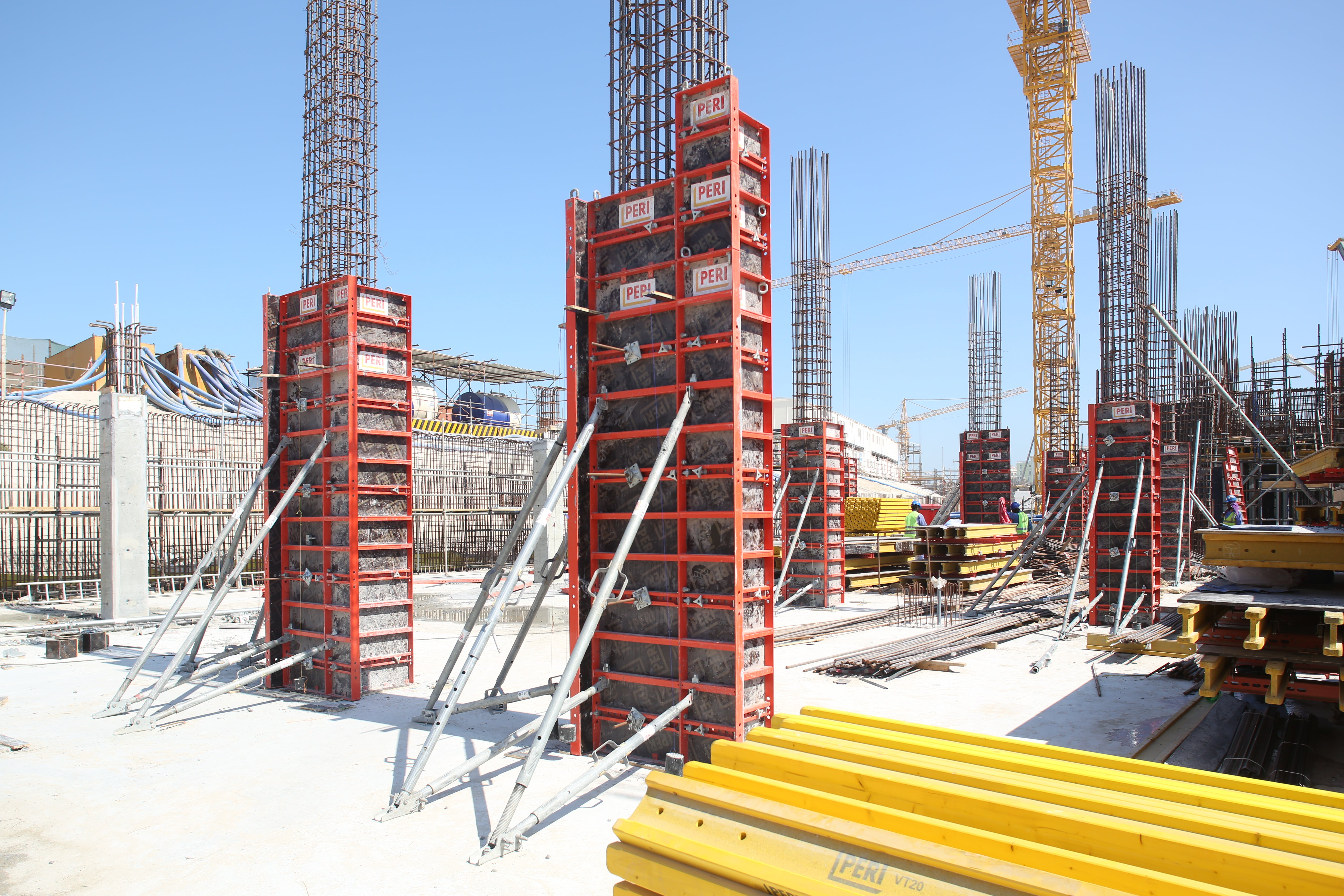 Light-weight hand-held column formwork for cost effective forming by hand.