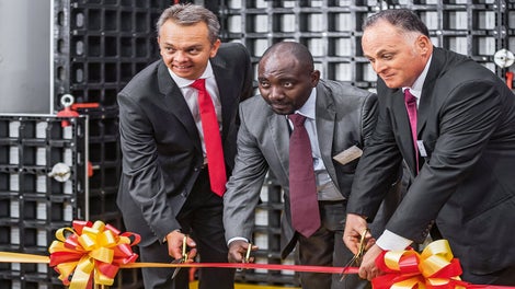 The launch event of the PERI subsidiary in Tanzania (f.l.t.r.): Theunis Visser, PERI Business Development South Africa; Johan Issack M. Peter, Director of Innovation, National Housing Corporation Tanzania; and Giuseppe Rosiello, Managing Director PERI Tanzania.