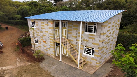 The blocks are produced locally, made by hand with our TwistBlock Mould, and assembled without mortar. 