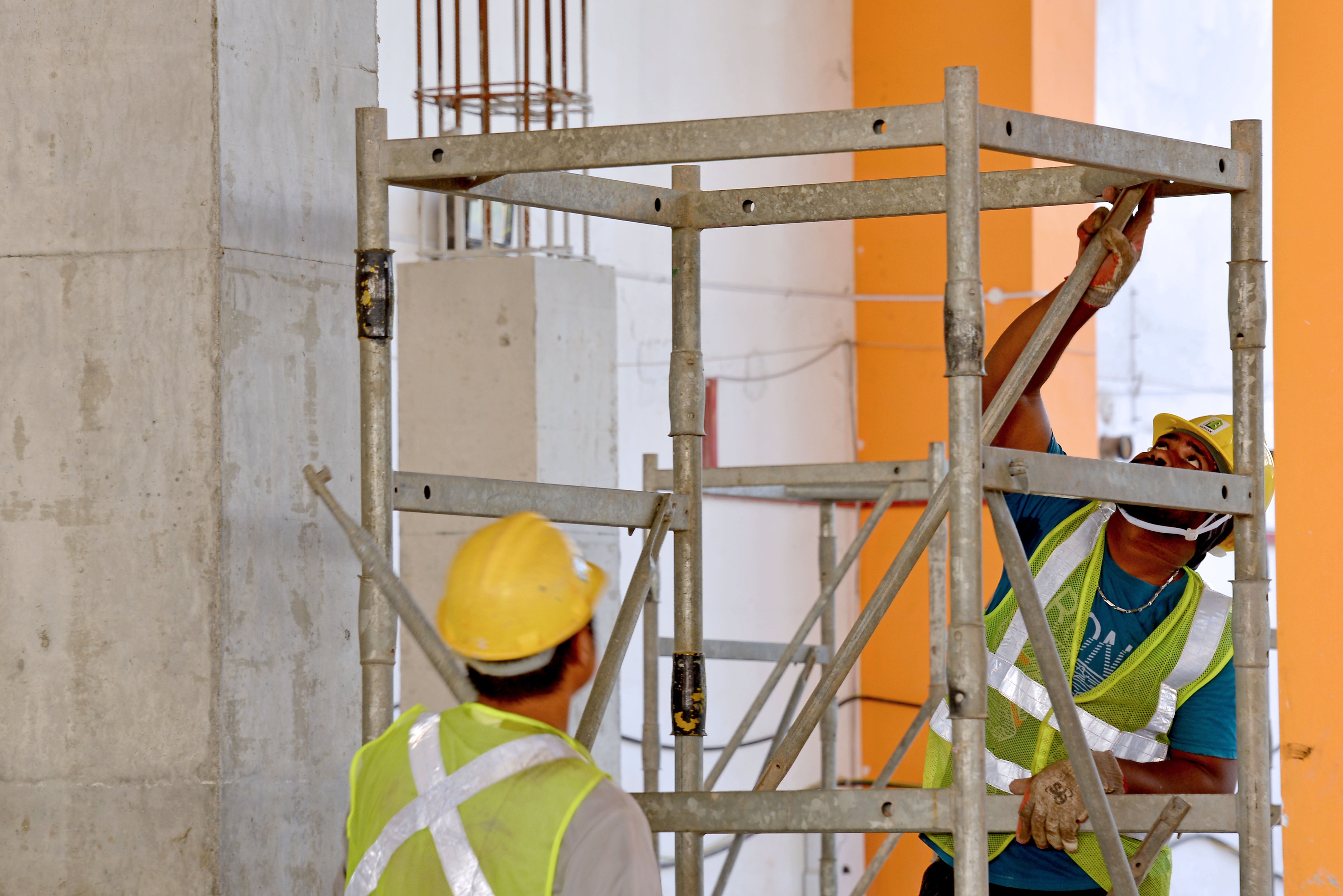 Site crew assembling ST100 Stacking Tower with ease