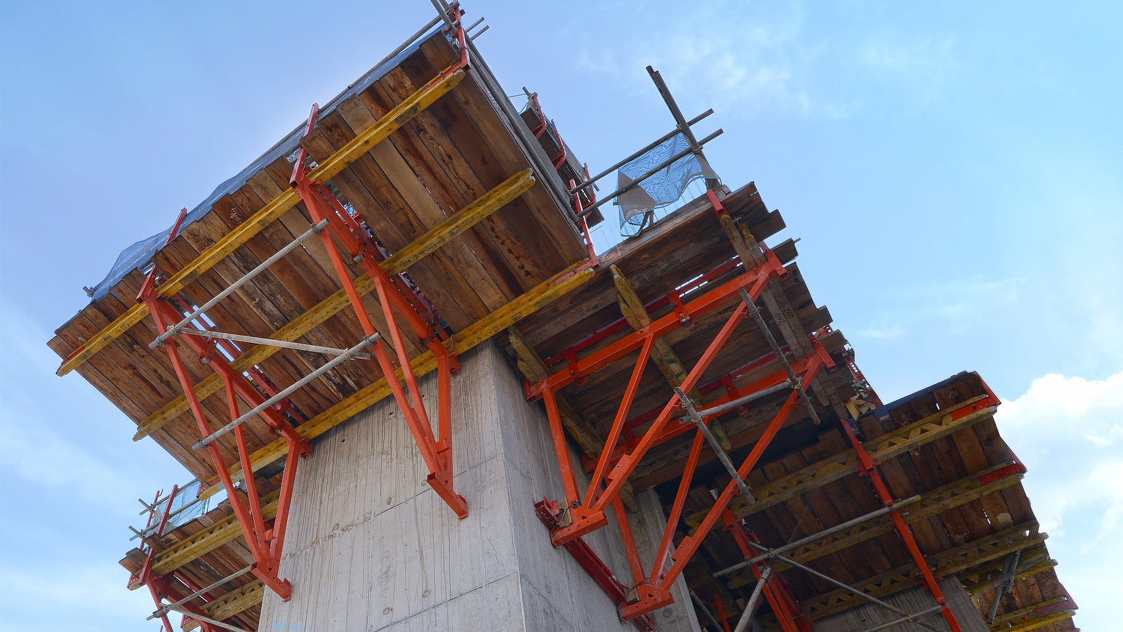 A closer look of CB 240 Climbing Formwork system climbing ahead of the slabs.