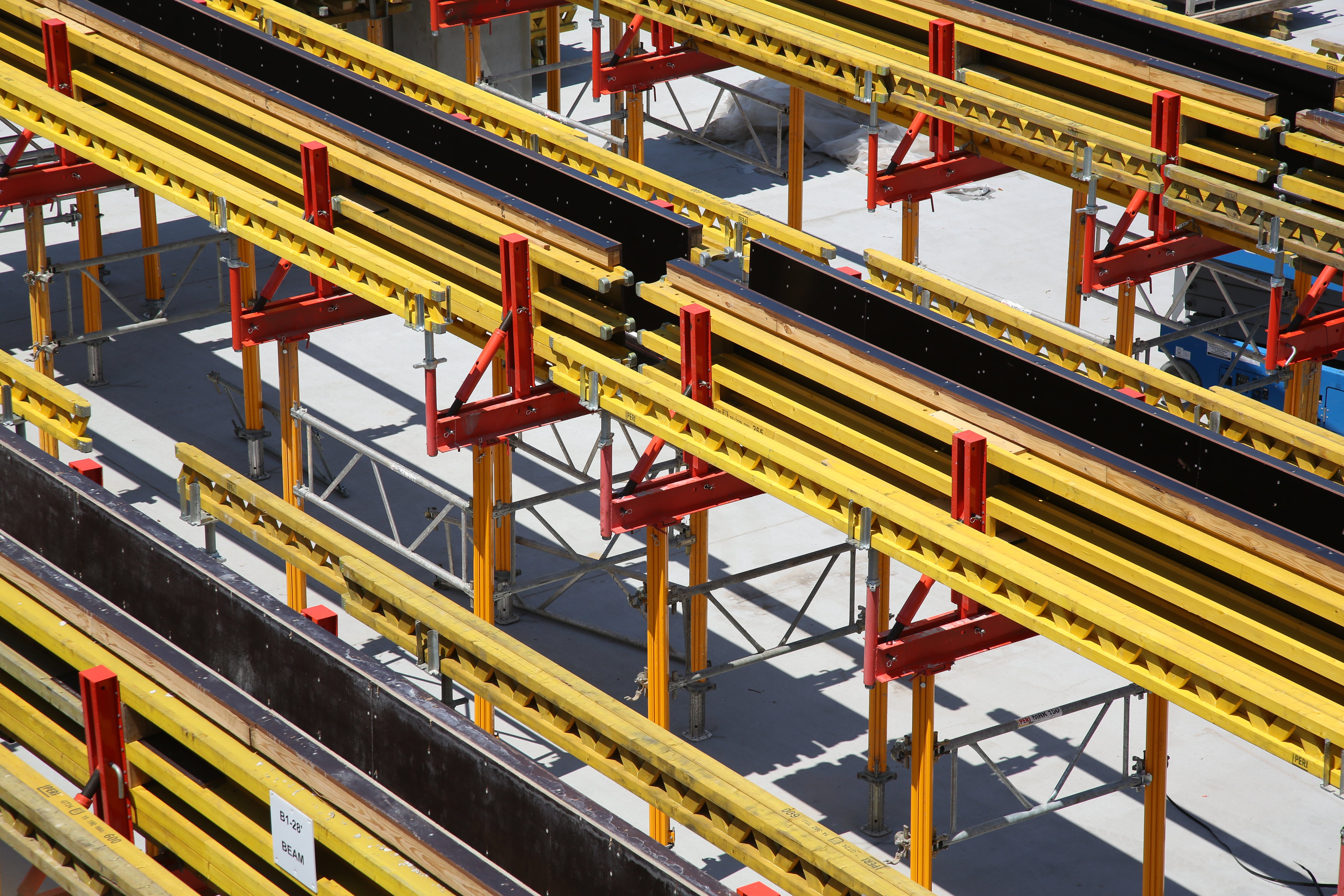 Here the preassembled beam forms have been set in place, the next step is to set the slab formwork.