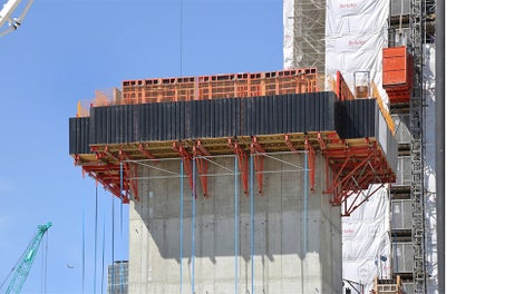 Large scaffold units of the securely assembled units consisting of platform and formwork in only one crane lift.