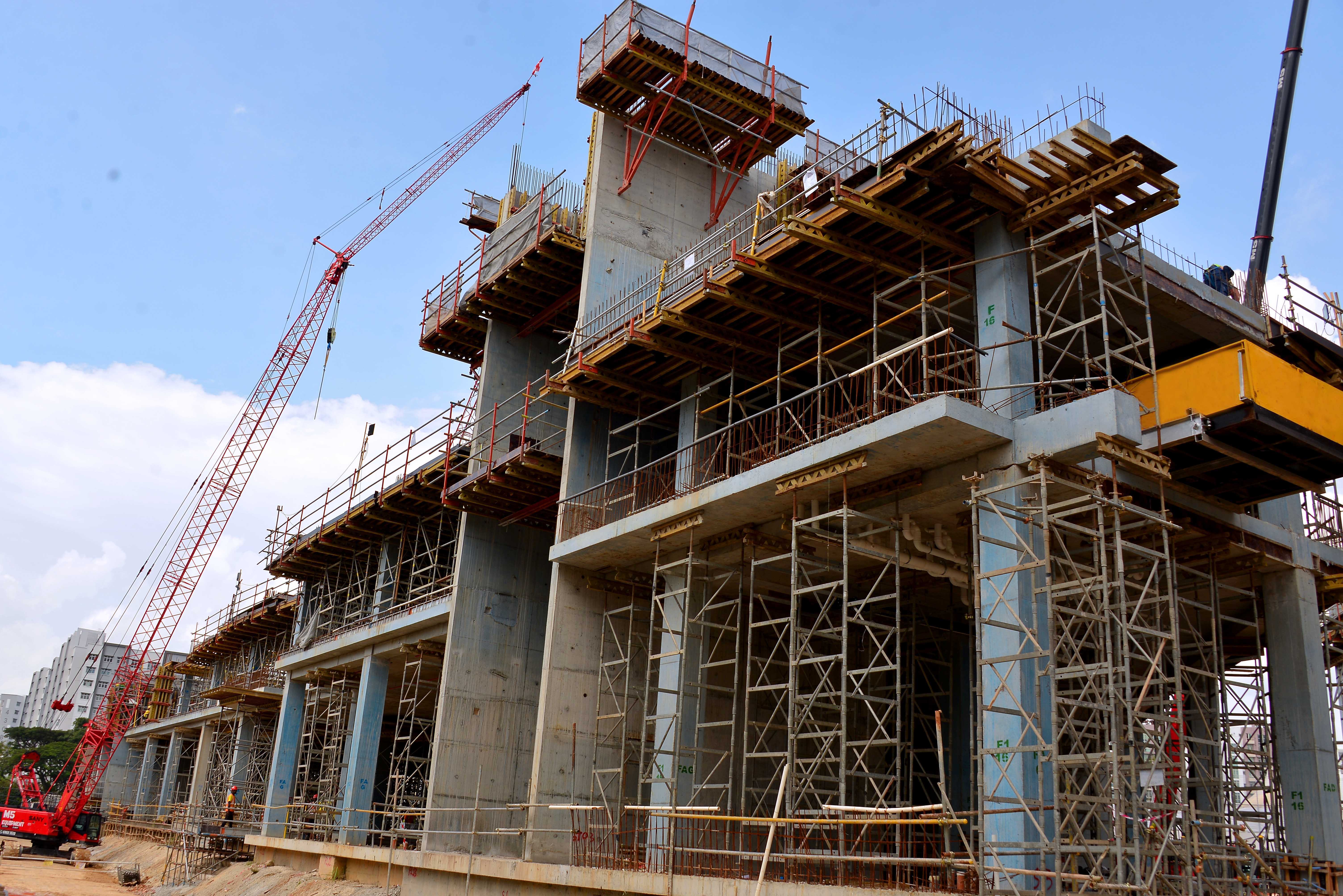PD 8 and ST 100 to suport beam and slab for 3rd storey. Cast ahead-walls using VARIO GT 24 CB 240 climbing brackets and BR Internal Platform with finishing platform.<br/>