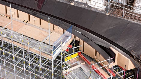 Supported by a PERI UP shoring and working scaffold, more than 200 customized elements were assembled on-site to create a complete 3D formwork structure.