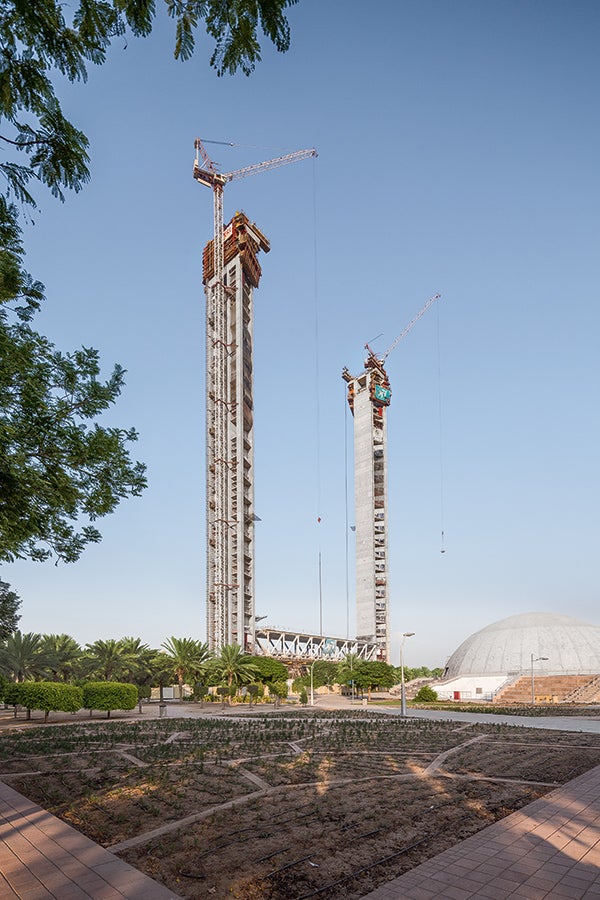 Construction of the two 155 m high towers with trapezoidal-shaped, extremely slender ground plans was realized using a reinforced concrete design. Within the angular core geometry, the in part only 30 cm thick walls had to be concreted and climbed.