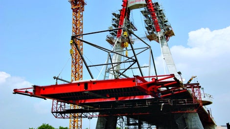  It features a span of 240m with one pylon carrying the main span of 120m and the nearest side span of 70m, and has 4 lanes and pavements in each direction. 