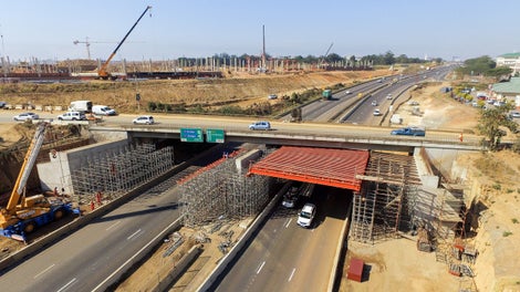 I-Beams used to span the road to not interrupt traffic flow 