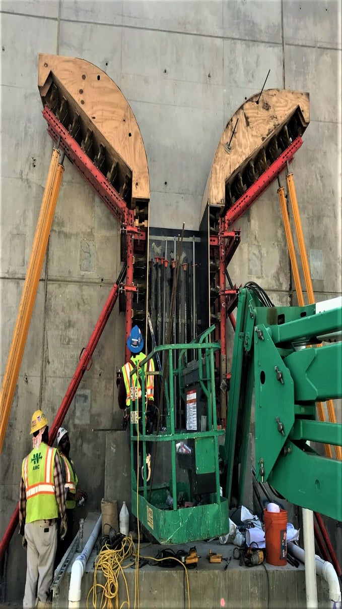 Setting the forms for the support columns that will hold up the stations curved canopy roof structure