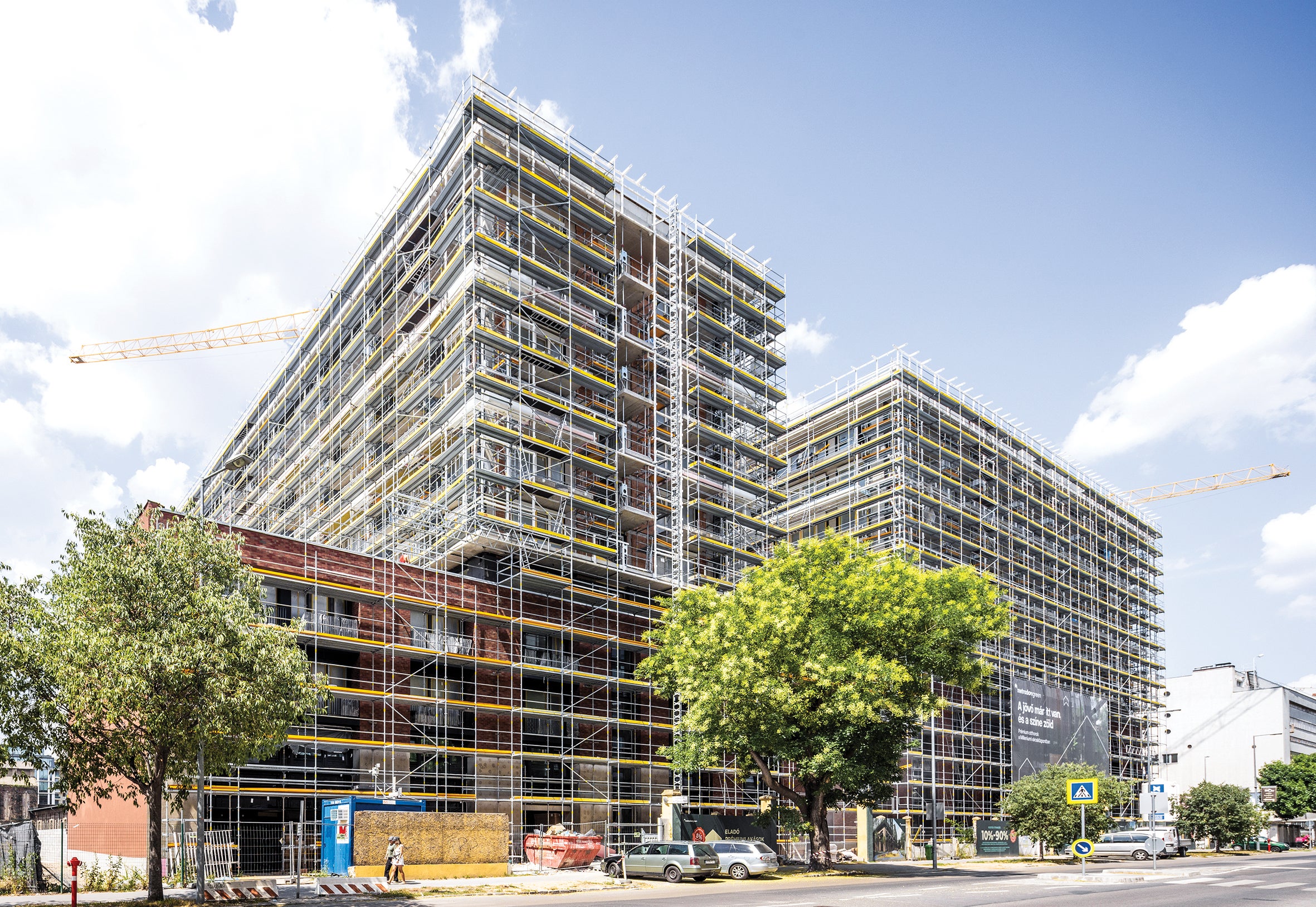 Con sus ventajas de sistema, el kit de andamio PERI UP contribuye de forma significativa a la construcción de una fachada responsable con el medio ambiente.<br/>(Foto: PERI SE)