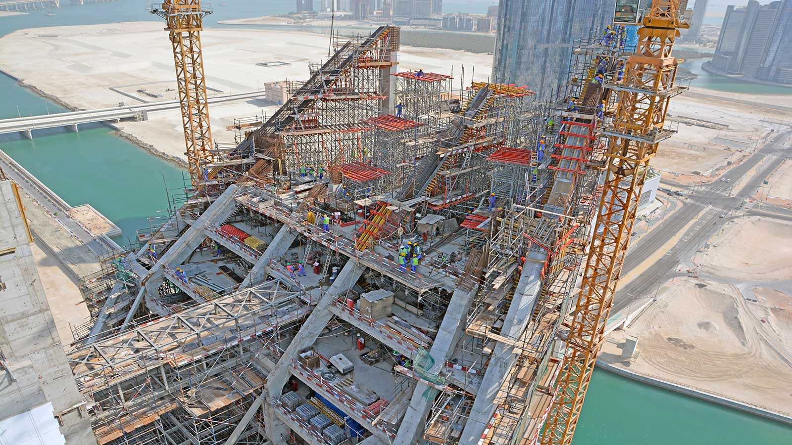 PD8 shoring system with a special formwork solution, acting as support to the huge inclined columns having a thickness of 2.5 m each