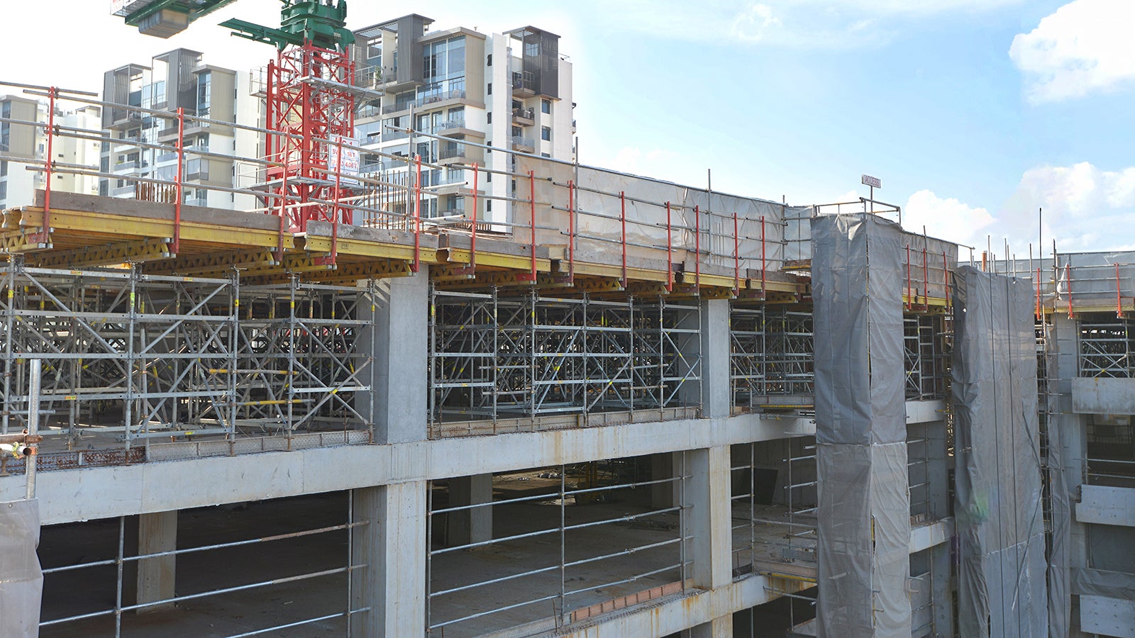 A closer look of one of the building in the Educational block with PERI UP Rosett scaffolds that are visible on the upper floors of the building.<br/>
