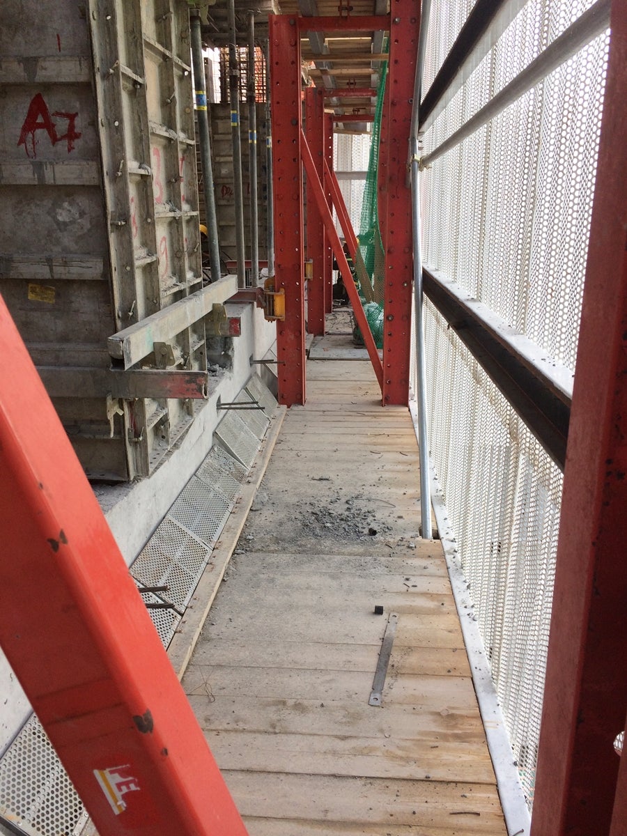 Screen Protection Panels ( RCS P) for perimeter enclosure and access for workers at lift core location (voids).