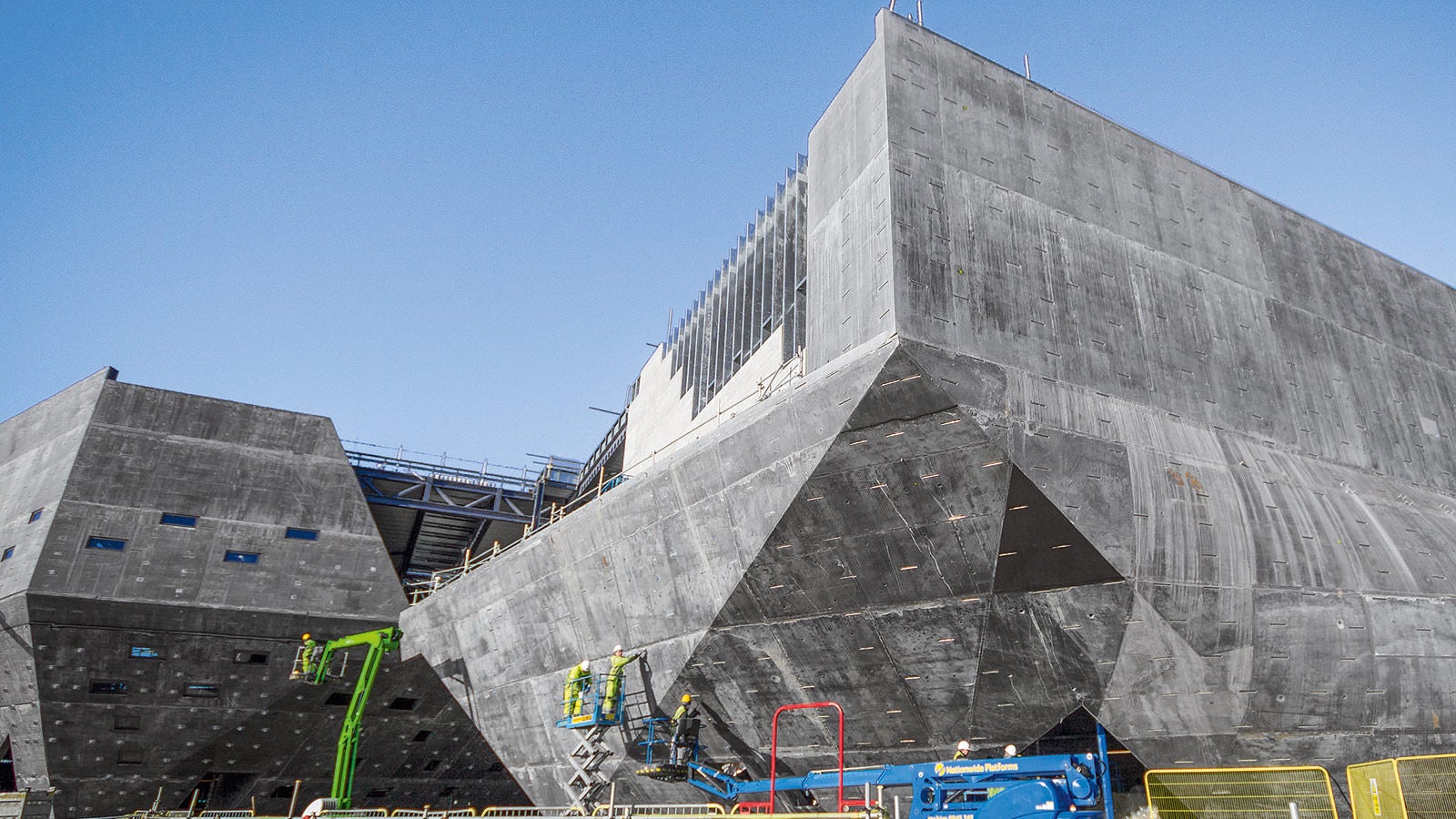 The transition from flat, triangular planes of walls 15 and 16 to the wrapped curves of wall 14 proved to be one of the most difficult challenges overcome by the PERI team. 