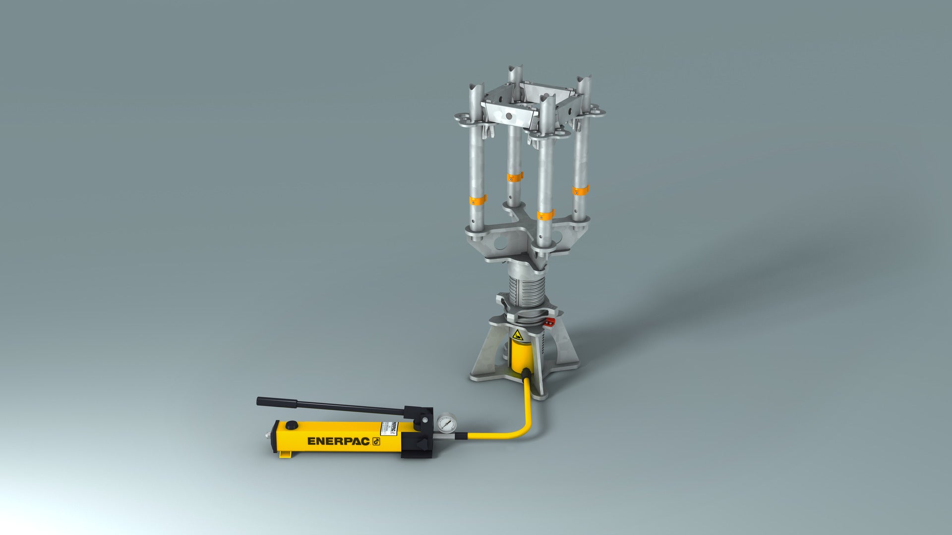 Die Hydraulik-Einheit besteht aus Hubzylinder und Handpumpe. Am Manometer lassen sich sowohl der Druck [bar] als auch die Kraft [kN] ablesen.<br/>