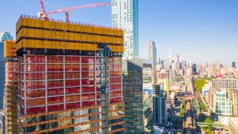 Wrapped in glass with bands of terra-cotta between each floor give the towers a unique and aesthetic appearance
