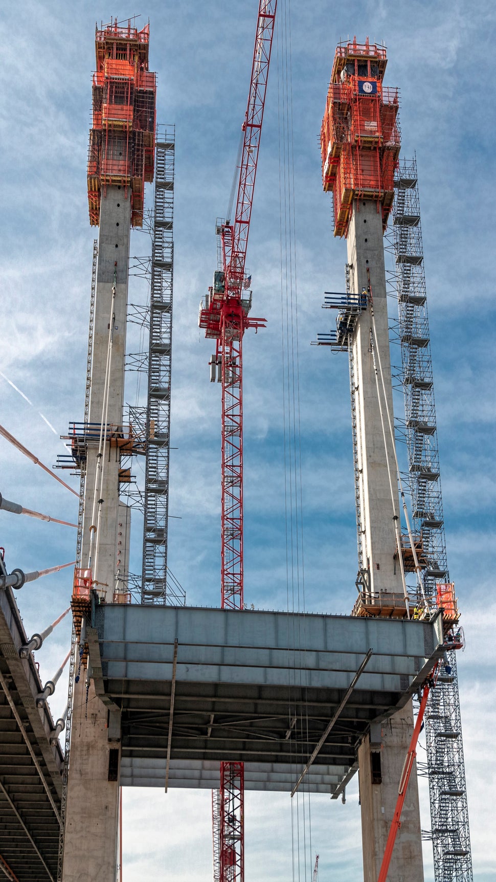 The hollow, rectangular pylons are about 20 feet by 11 feet at the bottom and taper to about 15 feet by 10 feet at the top.