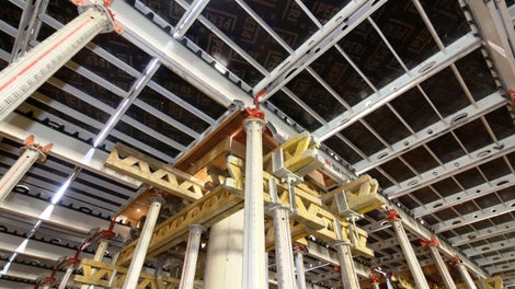 SKYDECK panels already have plywood integrated and SKYDECK beams have teeth that hold the panels in place after placing them on the beam.