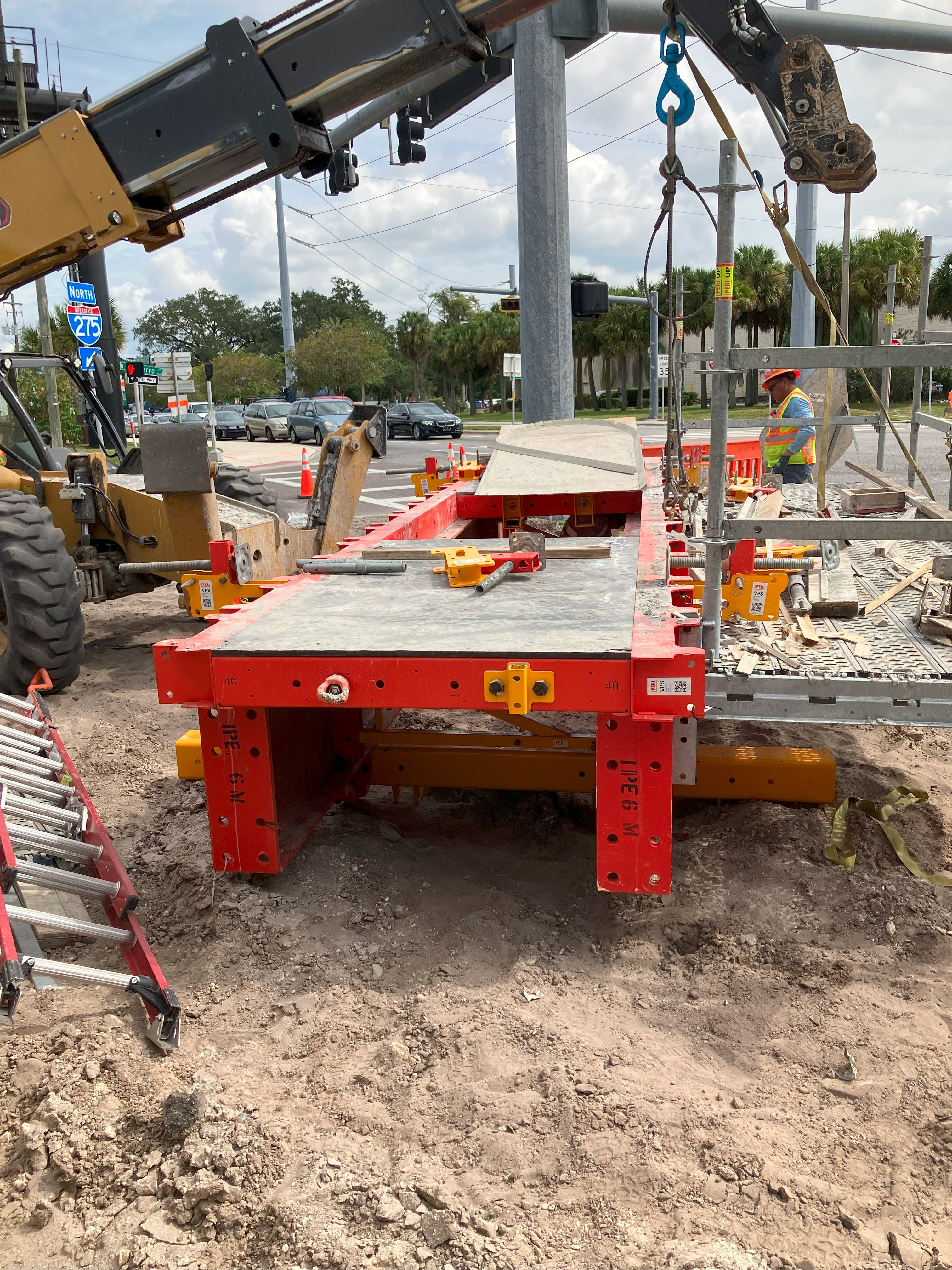 The dancefloor is being reassembled at the next location. The scaffold brackets and deck boards were removed to fit the unit on a legal flatbed haul truck and can be replaced in minutes by the crew.