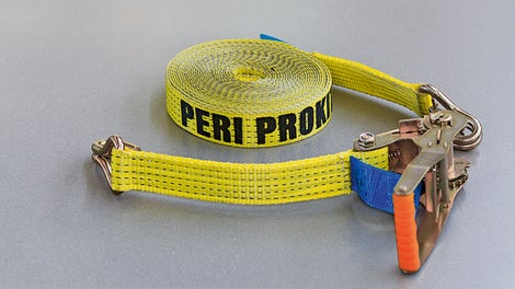 Upínací popruh PTB 12 se napne mezi dvě stojky a vytvoří spodní konstrukcí pro skládací mříž PFR. Dvoudílný popruh s délkou 12,00 m je vybaven hákem a pojistnou sponou.