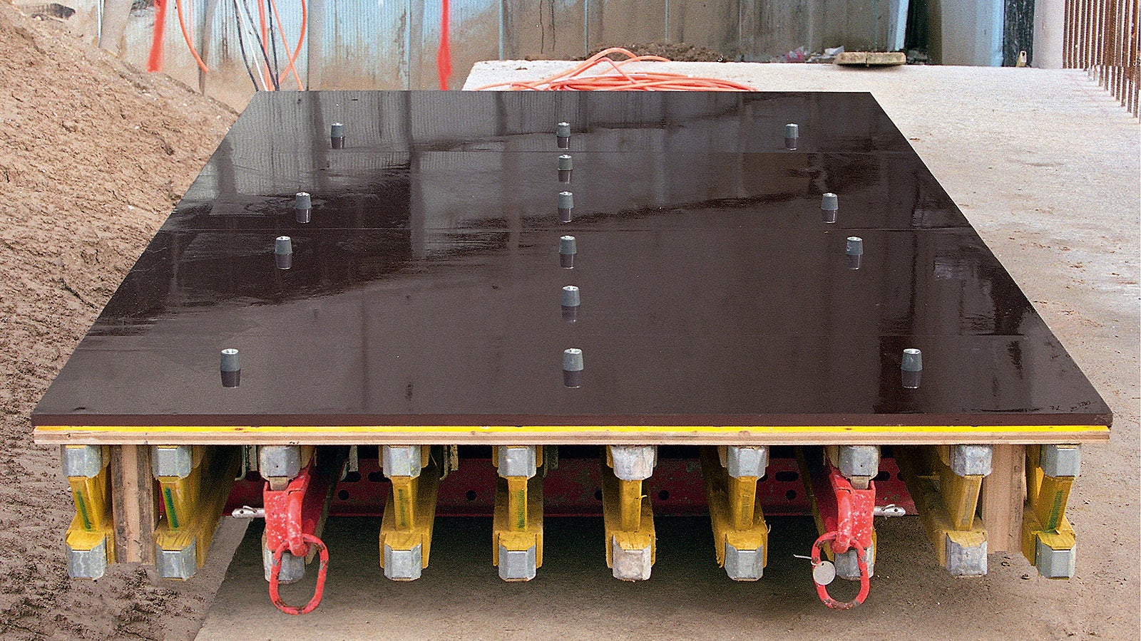 Ready-to-use VARIO GT 24 formwork element complete with blind plugs and sprayed with a release agent.