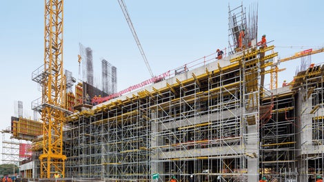 The loads resulting from the parapets, beams and slabs are reliably transferred by means of PERI UP Rosett shoring, also over the distance of several storeys.