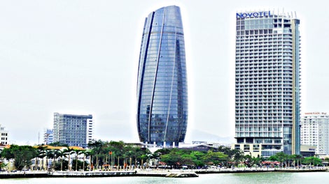 The glass facade spirals 166 m into the sky of Da Nang and give the administration building a futuristic appearance. 