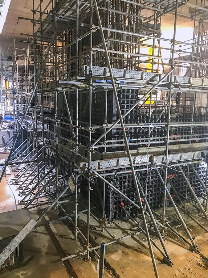 DUO are used to cast the wall of the narrow small walkway in the train station.